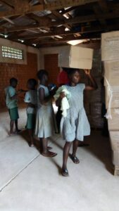 carrying box of food on head